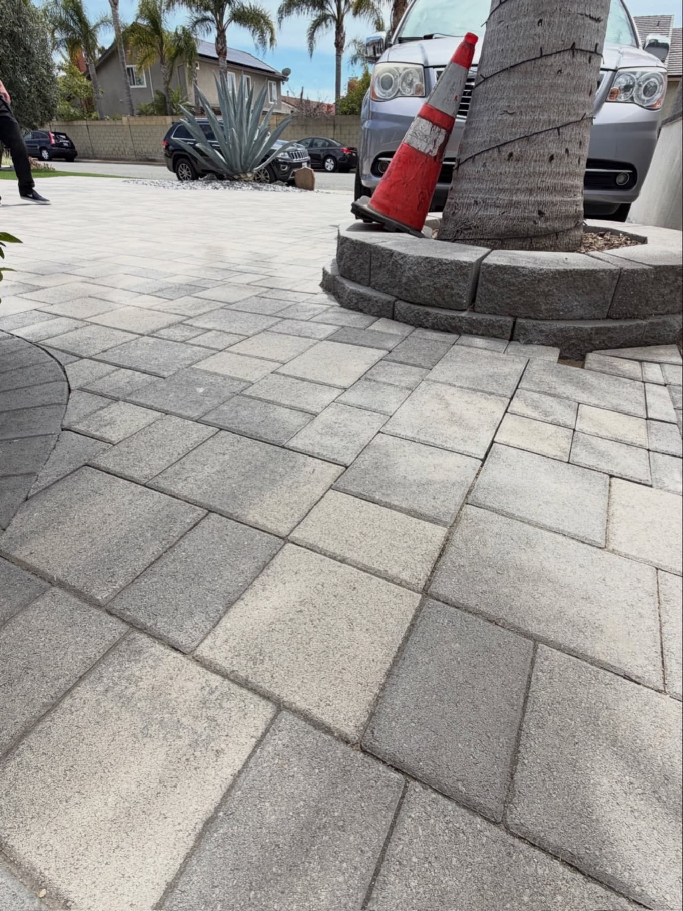 Restored paver driveway in Huntington Beach after re-leveling, re-sanding and sealing by Sea Spray Pros