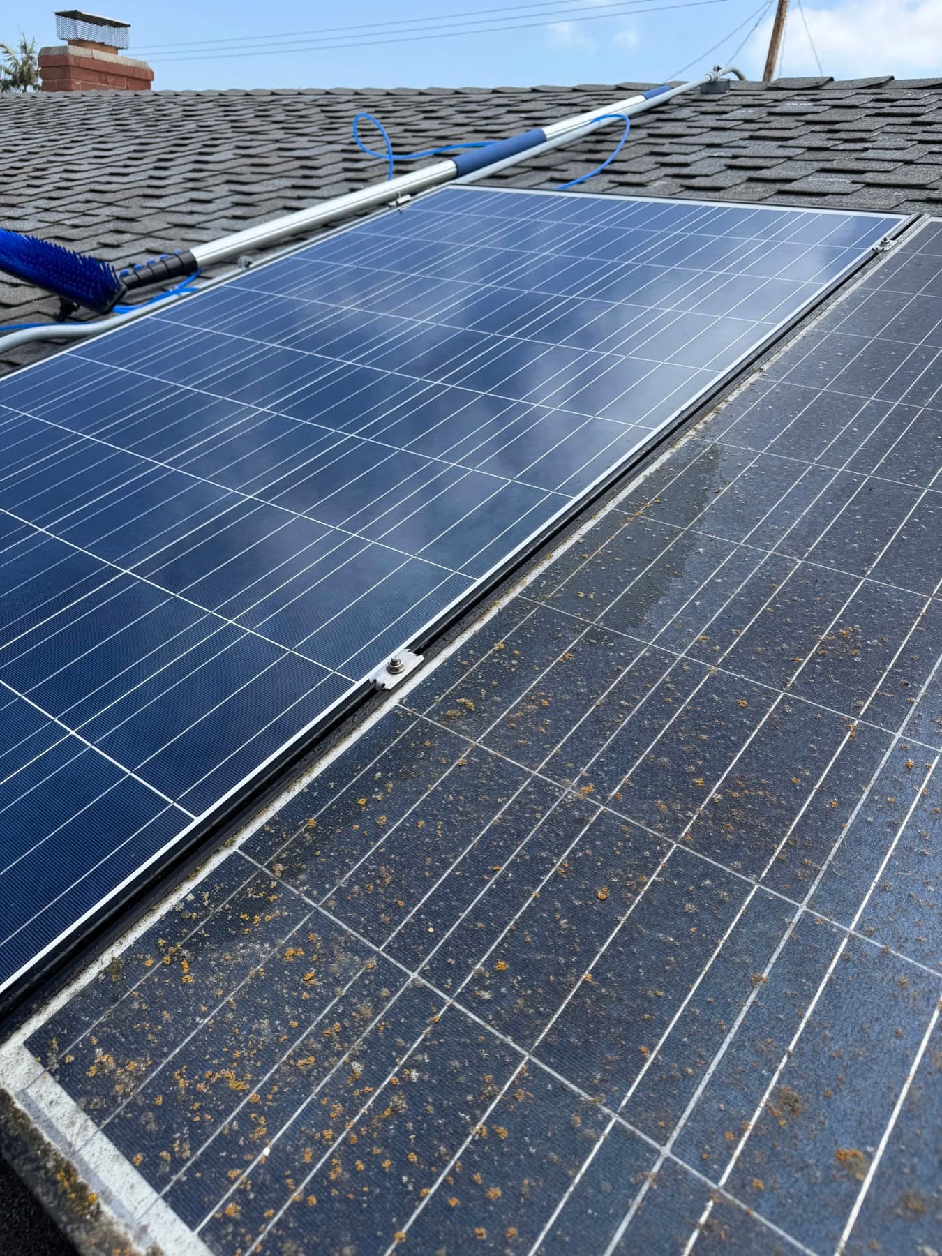 Side-by-side of a freshly cleaned solar panel next to a salt-hazed dirty one in Orange County